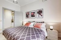 A bed or beds in a room at BDC - Prestige 3Bdr 3Bath in Monti District