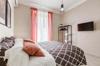 A bed or beds in a room at BDC - Prestige 3Bdr 3Bath in Monti District