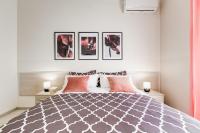 A bed or beds in a room at BDC - Prestige 3Bdr 3Bath in Monti District