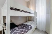 A bed or beds in a room at BDC - Prestige 3Bdr 3Bath in Monti District
