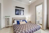 A bed or beds in a room at BDC - Prestige 3Bdr 3Bath in Monti District