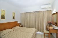 Posteľ alebo postele v izbe v ubytovaní Nektar Beach Hotel