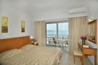 Posteľ alebo postele v izbe v ubytovaní Nektar Beach Hotel