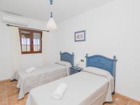 Łóżko lub łóżka w pokoju w obiekcie Cubo's Villa Ainhoa