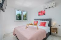 Posteľ alebo postele v izbe v ubytovaní Modern Apartments Elle Malinska