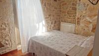 Postel nebo postele na pokoji v ubytování Casa grande cerca de la playa