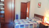 Postel nebo postele na pokoji v ubytování Casa grande cerca de la playa