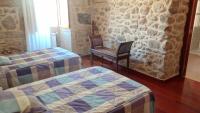 Postel nebo postele na pokoji v ubytování Casa grande cerca de la playa