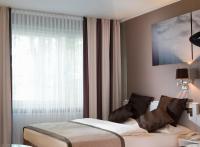 Park Hotel Hamburg Arenaにあるベッド