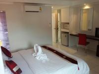 Postel nebo postele na pokoji v ubytování Kata Beach Studio Phuket