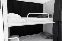 A bed or beds in a room at Kabul Party Hostel Barcelona