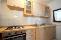 Kuchyň nebo kuchyňský kout v ubytování Apartments Petrovic