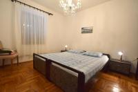Postel nebo postele na pokoji v ubytování Apartments Petrovic