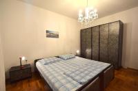 Postel nebo postele na pokoji v ubytování Apartments Petrovic