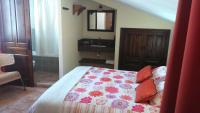 Cama o camas de una habitación en Hostal Rural Molino Del Bombo