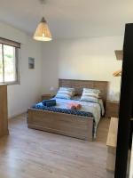 Posteľ alebo postele v izbe v ubytovaní Appartement « Marinella » splendide vue mer aux Sanguinaires