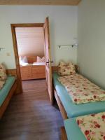 Postel nebo postele na pokoji v ubytování Steinhaus / Kamenny Dum