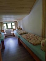 Postel nebo postele na pokoji v ubytování Steinhaus / Kamenny Dum