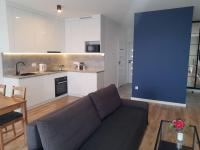 Kuchyňa alebo kuchynka v ubytovaní NEW APARTMENT Wołyńska - przestronny, z widokiem, czysto, parking, balkon