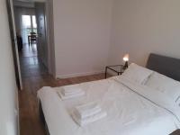 Posteľ alebo postele v izbe v ubytovaní NEW APARTMENT Wołyńska - przestronny, z widokiem, czysto, parking, balkon