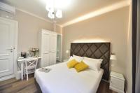 Posteľ alebo postele v izbe v ubytovaní Sacconi Palace Suite Roma