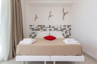 Posteľ alebo postele v izbe v ubytovaní Stella del Mare Rooms