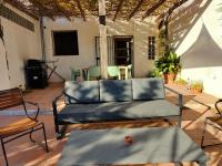 A seating area at Cortijo Vacas Gordas Villas