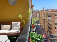 A balcony or terrace at Sun And Chic Malaga