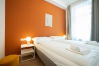 Posteľ alebo postele v izbe v ubytovaní Spacious apartment with huge shared terrace and grill located between city centre and Donau river