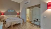 A bed or beds in a room at Cascina Volta