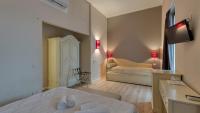 A bed or beds in a room at Cascina Volta
