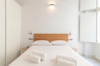 A bed or beds in a room at Allo Apartments San Roque 2ºA