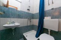 a bathroom with a toilet and a sink and a shower at Apartments with a parking space Gradac, Makarska - 14708 in Gradac
