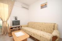 Televízia a/alebo spoločenská miestnosť v ubytovaní Apartments with a parking space Seget Vranjica, Trogir - 8507
