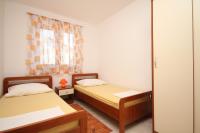 Posteľ alebo postele v izbe v ubytovaní Apartments with a parking space Seget Vranjica, Trogir - 8507