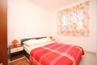 Posteľ alebo postele v izbe v ubytovaní Apartments with a parking space Seget Vranjica, Trogir - 8507