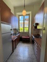 Kuchyňa alebo kuchynka v ubytovaní San Giusto I Villen-Ferienwohnung (EG)