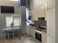Kuchyňa alebo kuchynka v ubytovaní Urban Loft