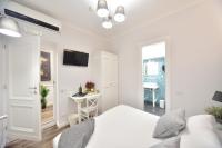 Posteľ alebo postele v izbe v ubytovaní Sacconi Palace Suite Roma