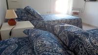 Postel nebo postele na pokoji v ubytování Habitación privada cerca de Cádiz con fácil aparcamiento