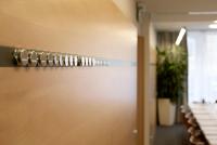 a row of lights on a wall in an office at Holiday Inn Vienna City by IHG in Vienna