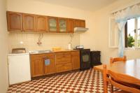 Kuchyň nebo kuchyňský kout v ubytování Apartments with a parking space Savar, Dugi otok - 8127