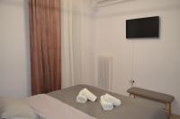 Posteľ alebo postele v izbe v ubytovaní Anastasias apartment tripoli