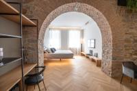 Łóżko lub łóżka w pokoju w obiekcie S1 Luxury Suites and Rooms