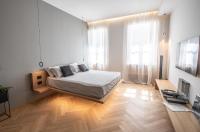 Łóżko lub łóżka w pokoju w obiekcie S1 Luxury Suites and Rooms