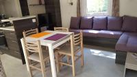 Kuchyňa alebo kuchynka v ubytovaní Agréable Mobilhome 6 - 8 places