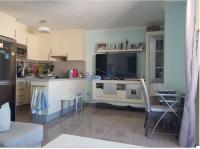 A kitchen or kitchenette at Penthouse ar okeana skatu