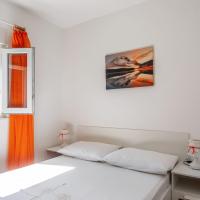 Postel nebo postele na pokoji v ubytování Holiday House IVA
