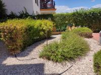 Zahrada ubytování Apartamento completo con piscina comunitaria y patio exterior