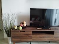 TV a/nebo společenská místnost v ubytování Unixx Pattaya